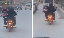 Akıl almaz yolculuk: Motosiklette bebek pusetiyle trafiğe çıktı!