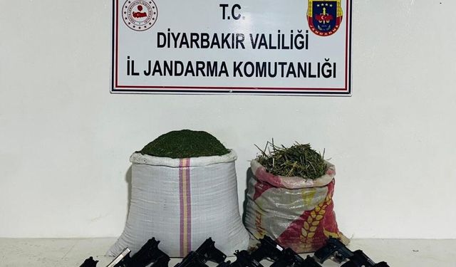 Diyarbakır’da kayalık alanda 16 tabanca ve 31 kilogram uyuşturucu ele geçirildi